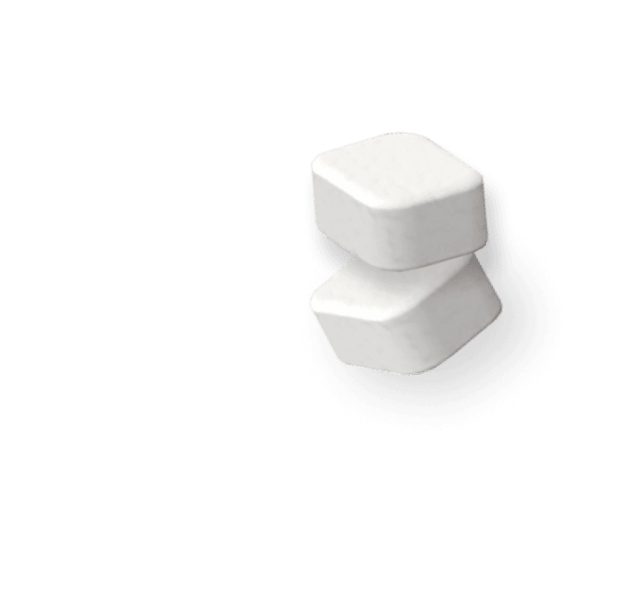 Two white dishwashing capsules