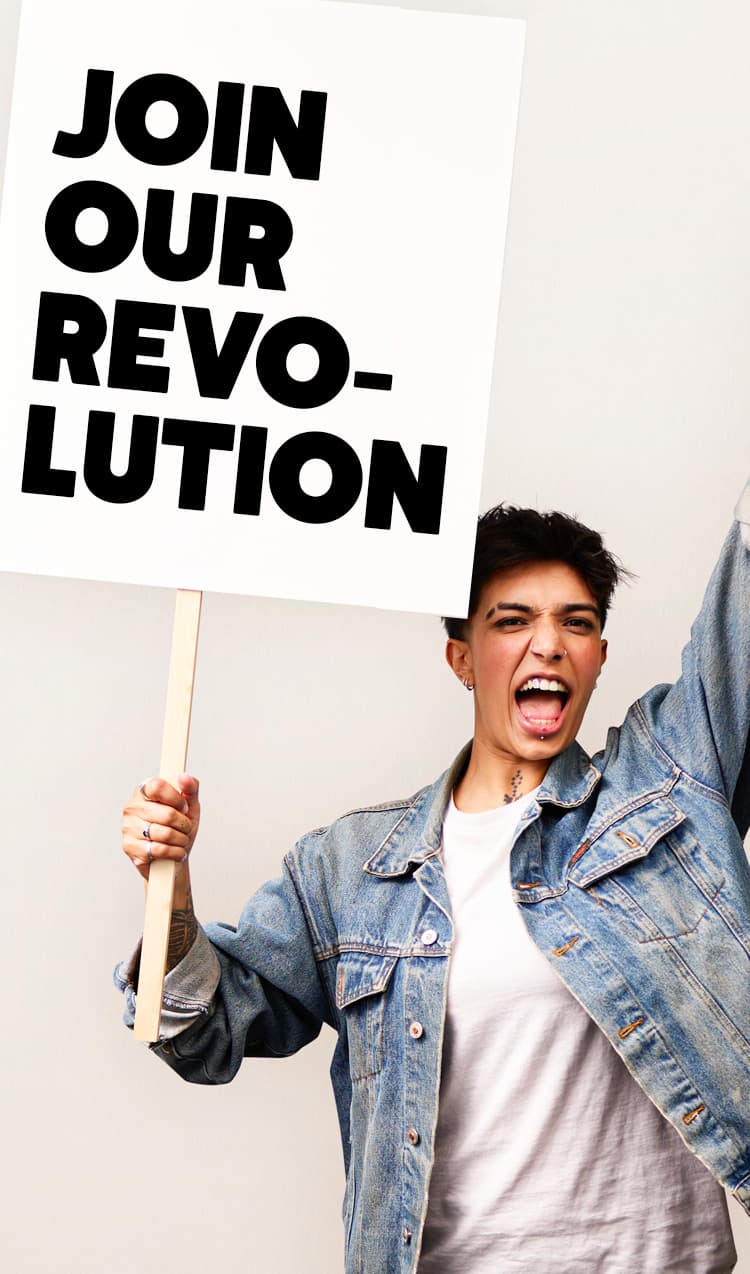 Person holding up a placard sign which reads "Join Our Revolution"